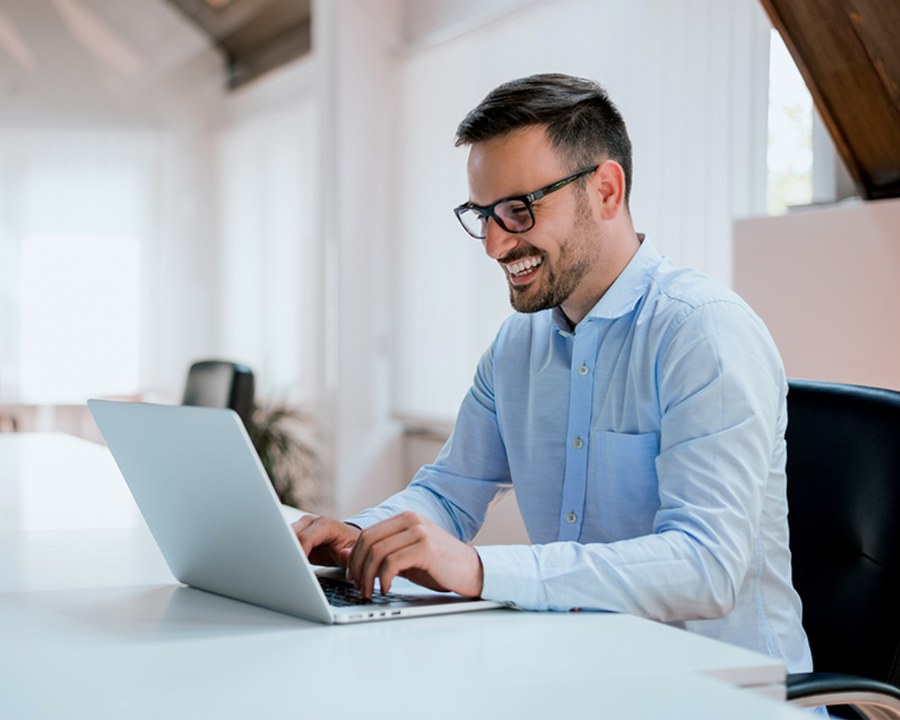 An employee working through e-learning on the PhishStrike platform